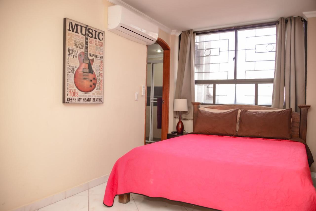 Calle 8 Suites Medellin Bagian luar foto