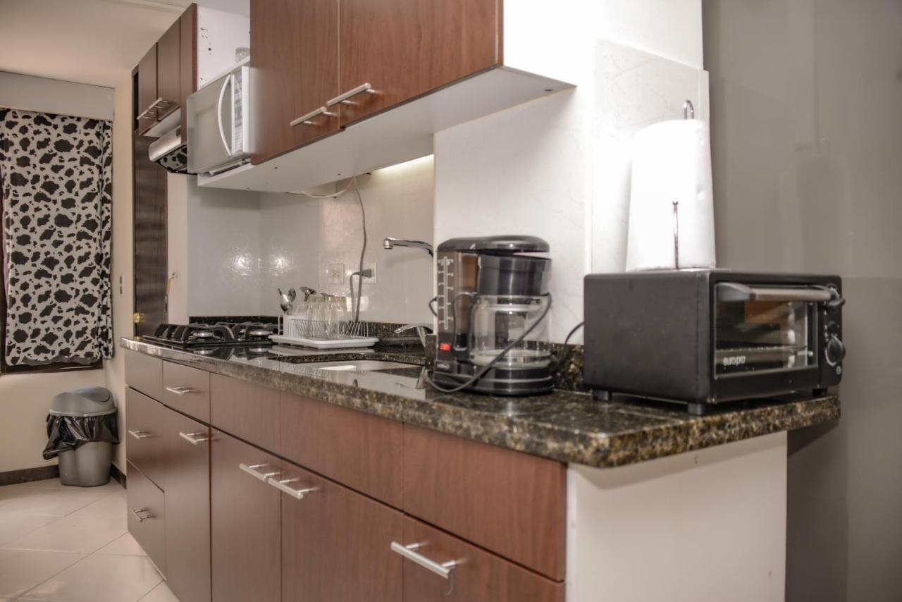 Calle 8 Suites Medellin Bagian luar foto