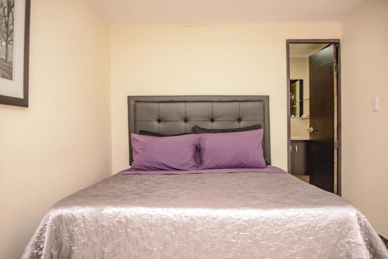 Calle 8 Suites Medellin Bagian luar foto