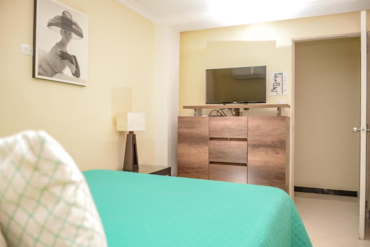 Calle 8 Suites Medellin Bagian luar foto