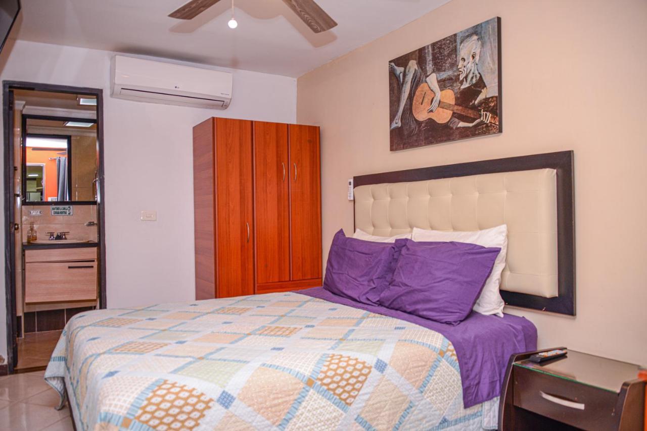 Calle 8 Suites Medellin Bagian luar foto