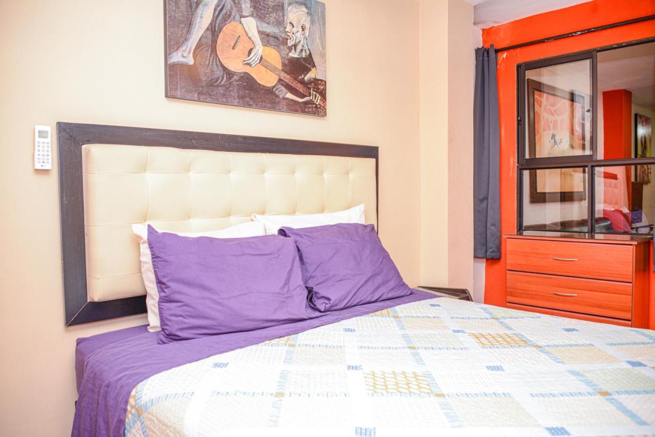 Calle 8 Suites Medellin Bagian luar foto